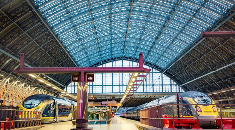 Passengers queue at London’s St Pancras station beneath the iconic Barlow roof during peak travel hours