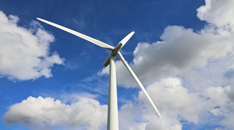 Offshore wind turbines in the North Sea under cloudy skies, highlighting aging infrastructure and future decommissioning challenges