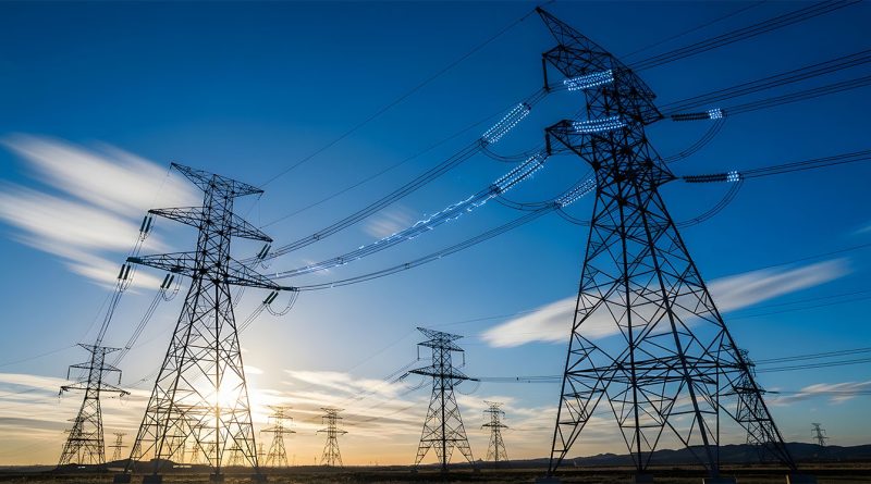 Engineers reviewing construction plans at a data centre site linked to the UK power grid