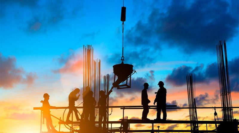 Construction site with crane under cloudy sky symbolising global uncertainty in project delivery
