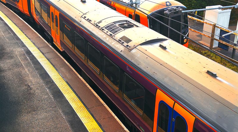 Passengers arriving at Manchester Piccadilly railway station during peak hours, illustrating UK regional rail traffic.
