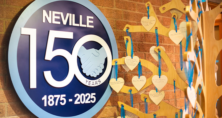 a commemorative sign for the 150th anniversary of Neville.
