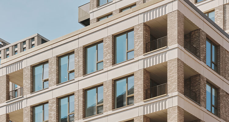 the facade of a modern, multi-story residential building